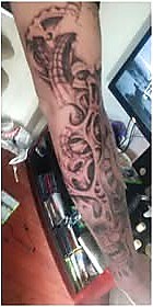 Coverups tattoo on Forearm sleeve — after