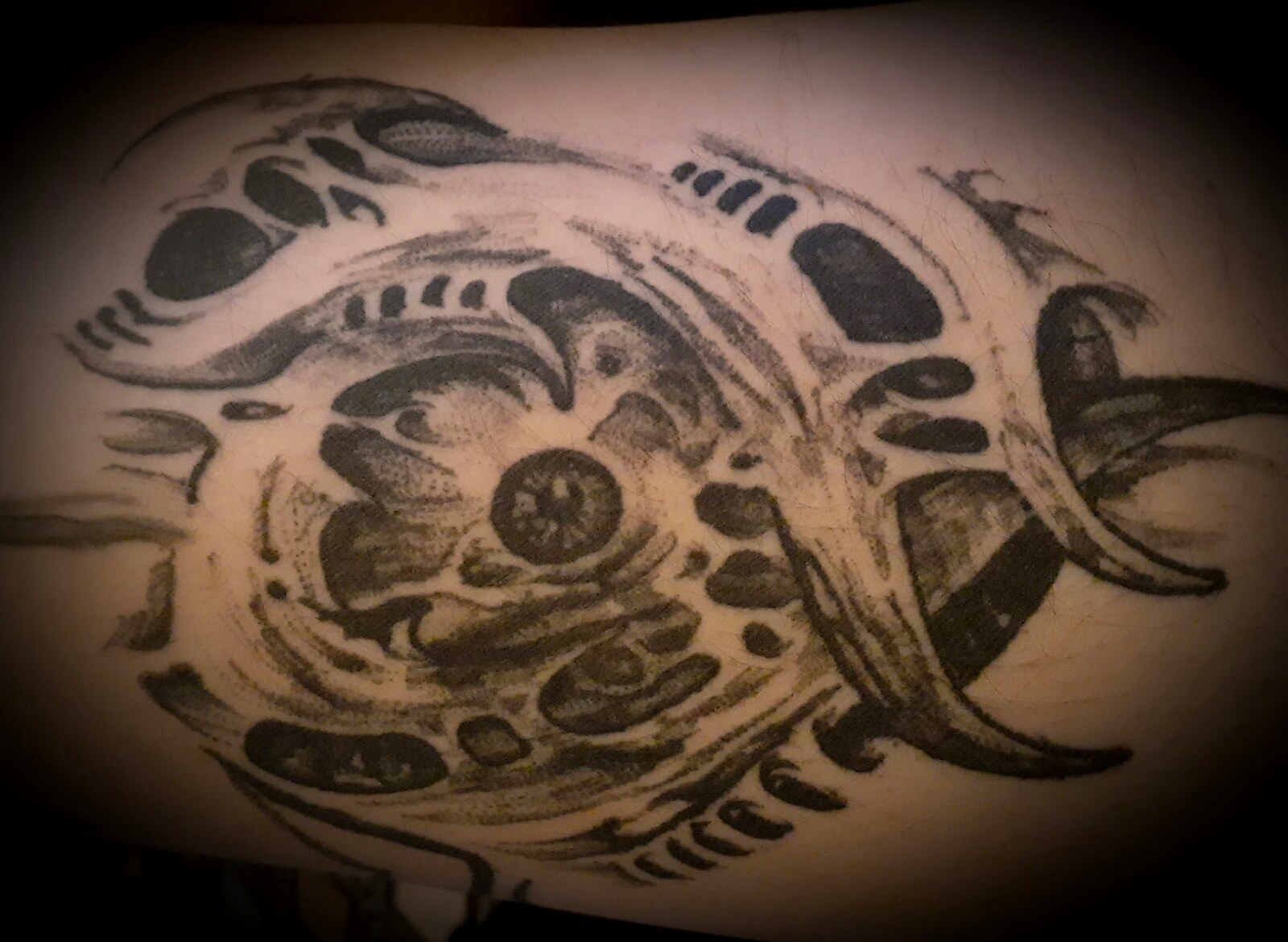 Custom Work tattoo on Bicep